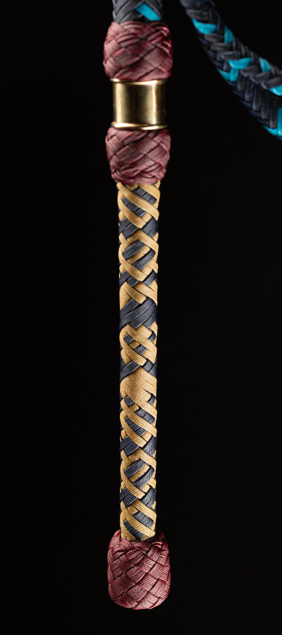 The handle of an 8 foot Nightlord Bullwhip