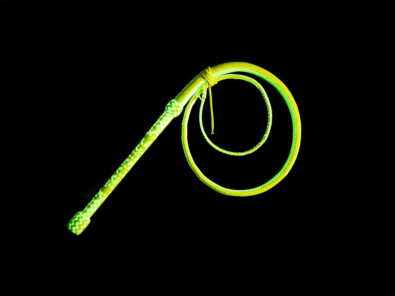 The Circus Whip glowing in the dark after being charged with UV light