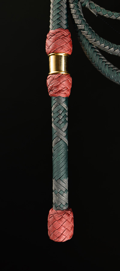 The handle of a 7 foot Mando Bullwhip