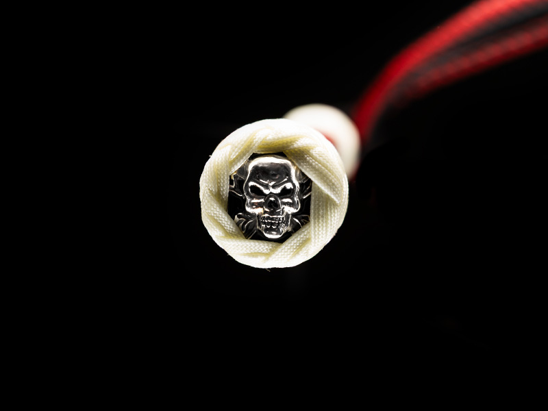 The pirate skull concho of a 7 foot Harlequin Bullwhip