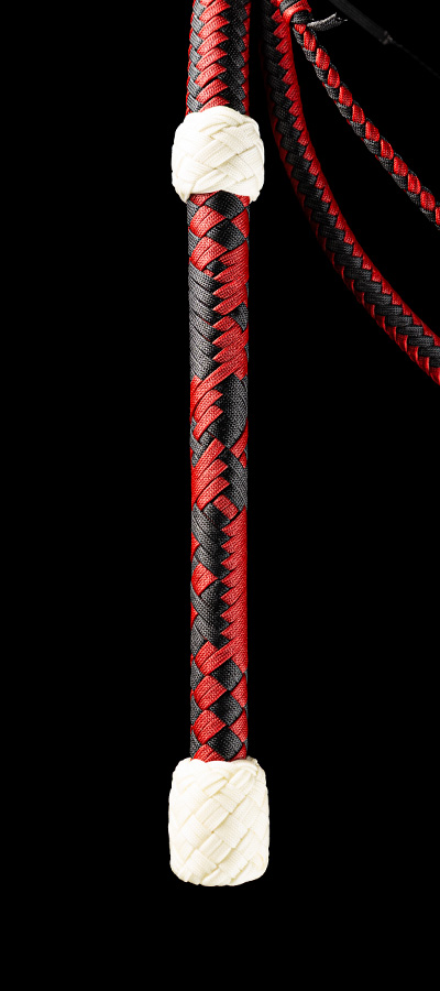 The handle of a 7 foot Harlequin Bullwhip